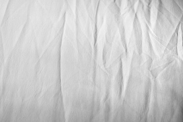 Fototapeta na wymiar Wrinkled gray fabric for abstract background texture With soft wave conditions for the background