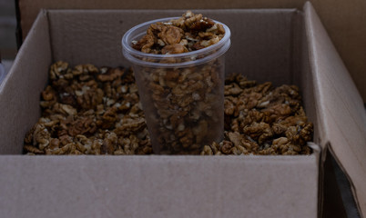 Walnuts peeled in a box for sale