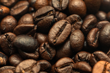 macro of roasted coffee beans background, the texture pattern
