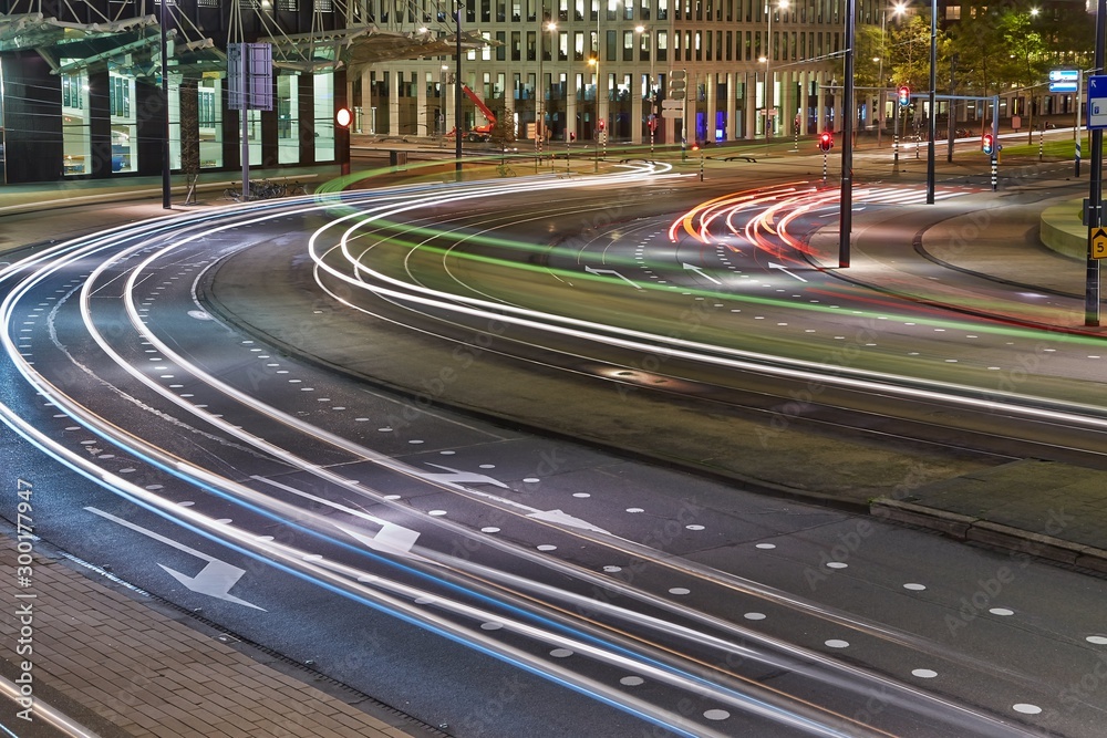 Wall mural urban traffic at night with blurred lights trails