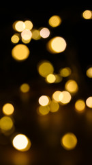 Golden christmas bokeh, candle glowing light background.