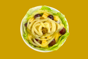 Vegetable Salad Cream die cut in yellow background.