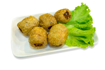Deep Fried Crab meat roll, die cut on white background, focus selective.