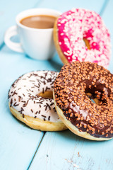 Sweet donuts on black stone table