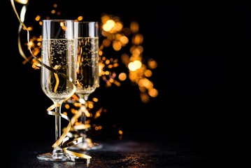 Fototapeta champagne glasses with sparkles obraz