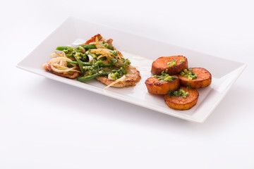sweet potato pork steak, bistec de credo batata, meal on white plate on white background