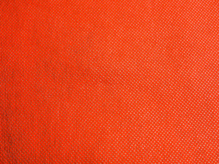 Abstract gradient background of rough vivid or vibrant red paper pattern and texture.