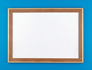 wooden frame on blue background