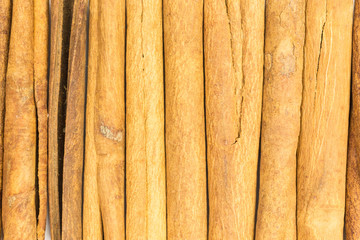 background of cinnamon sticks - cinnamomum verum