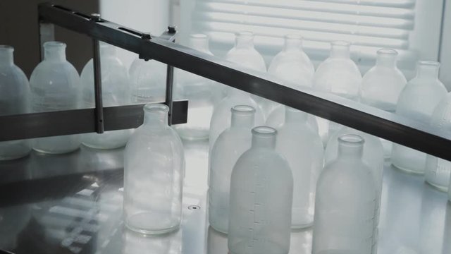 Injection bottle washing and disinfection conveyor.