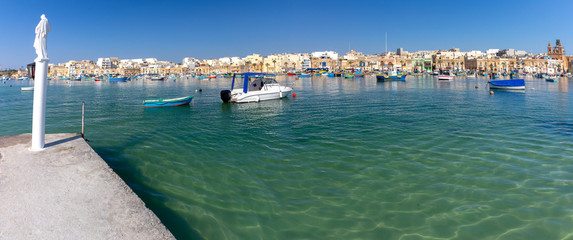 Fototapeta na wymiar Panorama of the harbor and village Masashlokk.