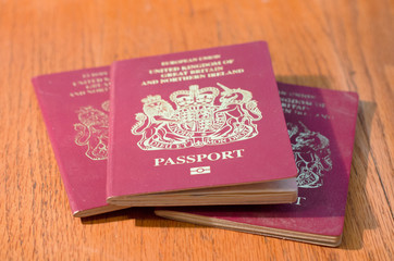 3 passports in a stack