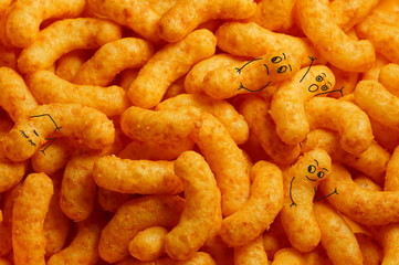funny smiling peanut flip background, detailed close-up of peanut Puffs. Full frame of peanut curls