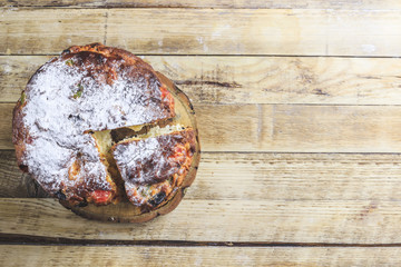 Traditional Christmas panettone with raisins and dried fruits