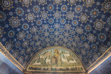 RAVENNA, ITALY - September 11, 2019: Travel view of Ravenna featuring Mausoleum Galla Placidia mosaic stars sky cross ceiling. The image location is Emilia Romagna in Italy, Europe. - obrazy, fototapety, plakaty