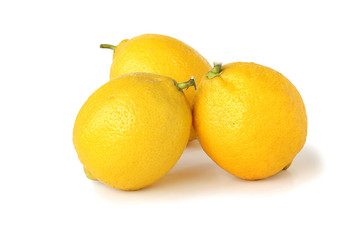 Three lemons isolated on white