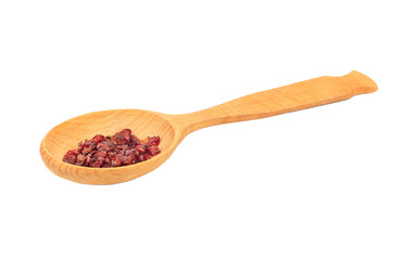 Dry barberry in spoon