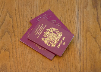 3 passports in a stack