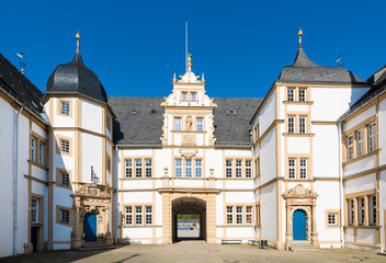 Fototapeta na wymiar The courtyard of Neuhaus Castle, former residence of bishop princes, is quite a famous Renaissance castle near Paderborn. North Rhine-Westphalia, Germany, Europe