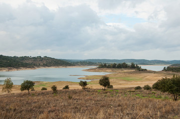 Fototapeta na wymiar Dam bed on the Tejo river, in Portugal, without water. It is possible to walk where there should be many cubic meters of water