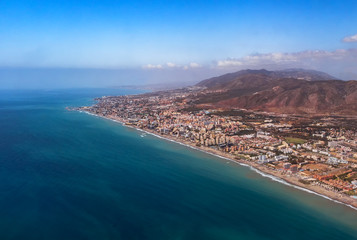 Aerial view from a plane of the coast of Torremolinos, Benalmadena and Fuengirola and Costa del...