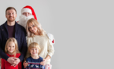 Family portrait with Santa Claus