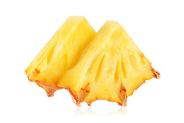 Two triangle slices of pineapple isolated on white