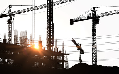 Silhouette of worker are working at construction site on white background.