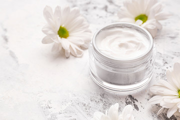 Fototapeta na wymiar Jar of cosmetic cream on white background