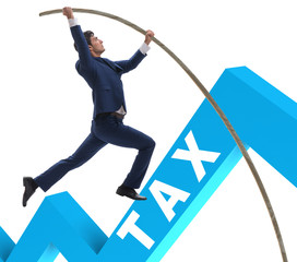Businessman jumping over tax in tax evasion avoidance concept