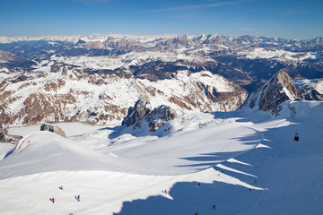 Fototapeta na wymiar Dolomites, Italy - mountain Marmolada, Mountain skiing and snowboarding