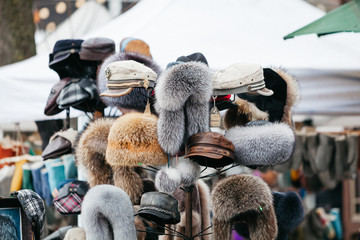 Real fur hats at market in winter