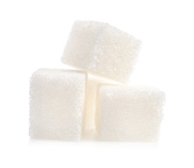 Sweet sugar cubes on white background