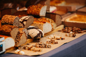 dark and white bio bread from farmers on cutting board