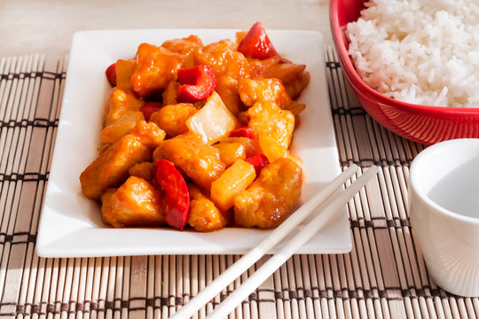 Sweet and sour chicken with bell pepper and pineapple