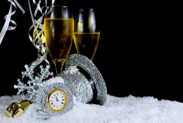 Image for New Year includes the face of a clock nearing twelve o'clock and sparkly accent pieces....