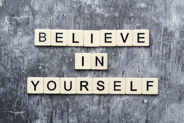 Letters forming a motivation phrase Believe in yourself