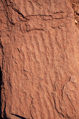 Time and water leave their marks on the surface of the sandstone rock faces of Capitol Reef National Park, Utah