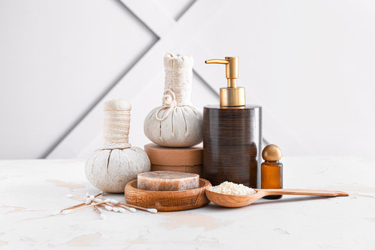 Cosmetics With Herbal Bags On White Table