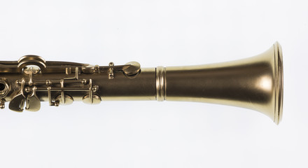 Obraz premium golden clarinet isolated on white background