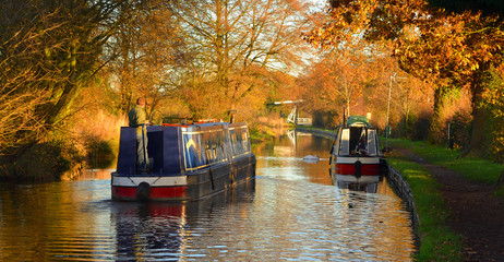  Narrow boats  on the Llangollen canal, at Wrenbry  boats and reflections in Autumn - obrazy, fototapety, plakaty