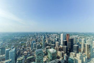Fototapeta na wymiar Aerial view of Toronto City Skyscrapers, Looking northeast from top of CN Tower toward East York and Scarborough districts in summer, Union Station at bottom right. Toronto City, Ontario, Canada