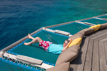 Man is relaxing at Maldives