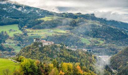 Panoramic autumn view with Sabiona Monastery near Chiusa, Province of Bolzano, Trentino Alto Adige, Italy.