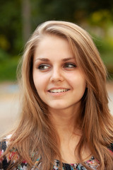 Closeup portrait of a happy young women smiling