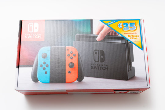 Nintendo Switch video game console developed by Nintendo, released on March  3, 2017 on a white background. Germany, Berlin - June 30, 2019: Nintendo  Switch Joy-con controller on a white background Stock Photo