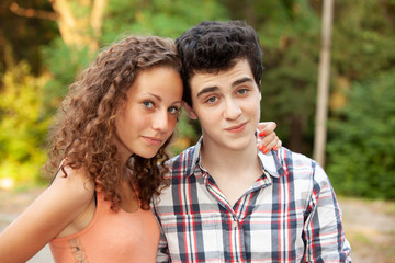Portrait happy young teenage couple outdoor