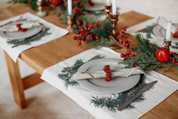 Beautiful festive table setting for Christmas dinner at home
