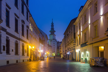 Fototapeta na wymiar Image of night streets of Bratislava with Michael Gate