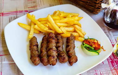 Grilled dish of minced meat Cevapcici